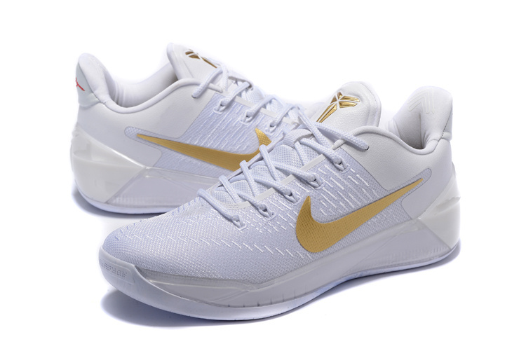 white and gold shoes nike