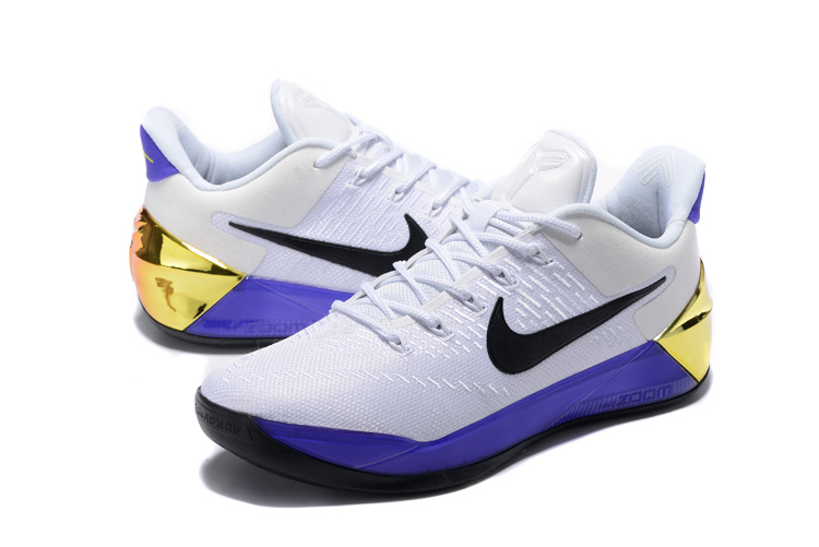 purple and gold nike basketball shoes