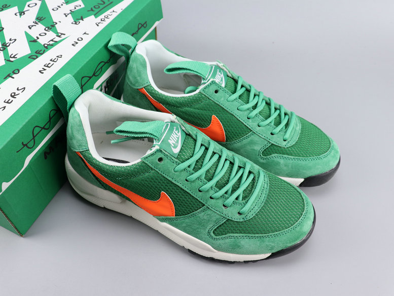 green and white nike sneakers