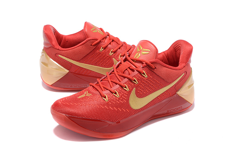 red and gold shoes nike