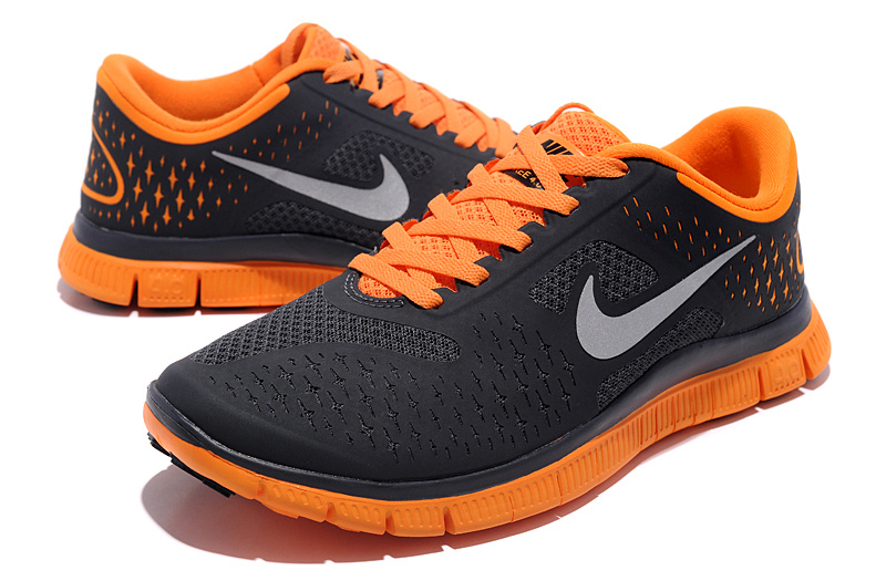 orange and black nike running shoes