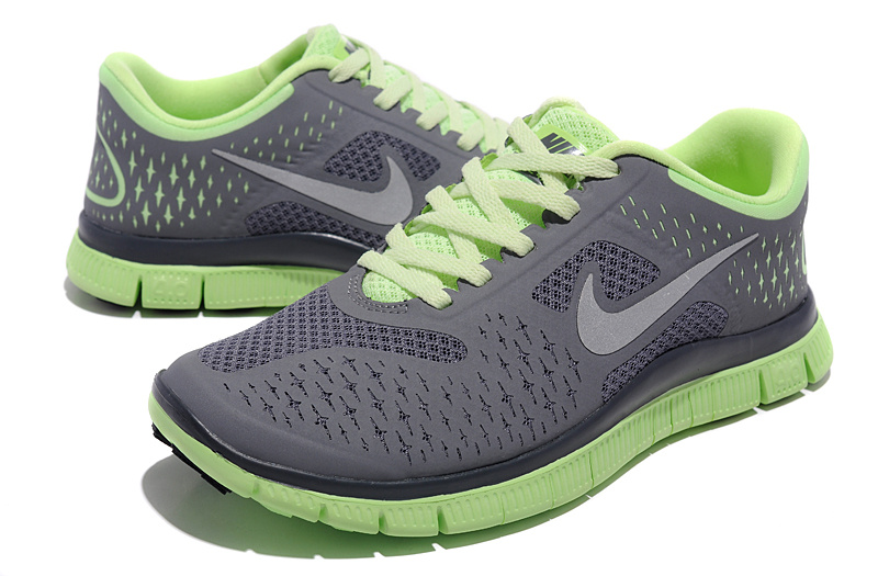grey and green nike shoes