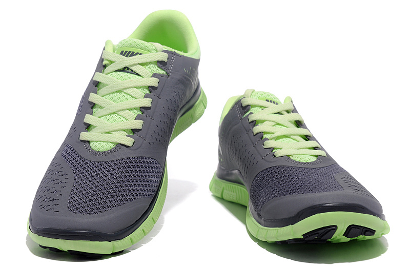 grey and green nike running shoes 